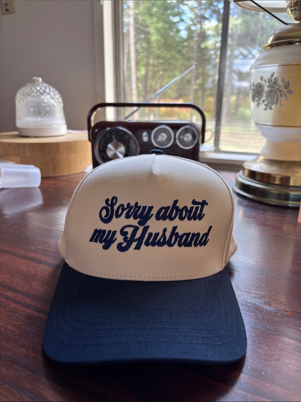 C.C Sorry About My Husband Embroidered Trucker Hat - Beige and Navy
